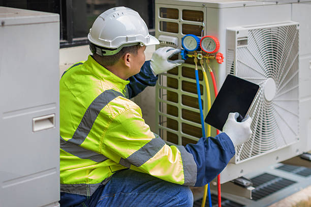 Professional Air Conditioning Repair technician working in Canton, MA
